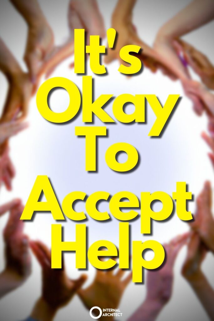Blurred photo of hands in a circle with the text It's Okay To Accept Help